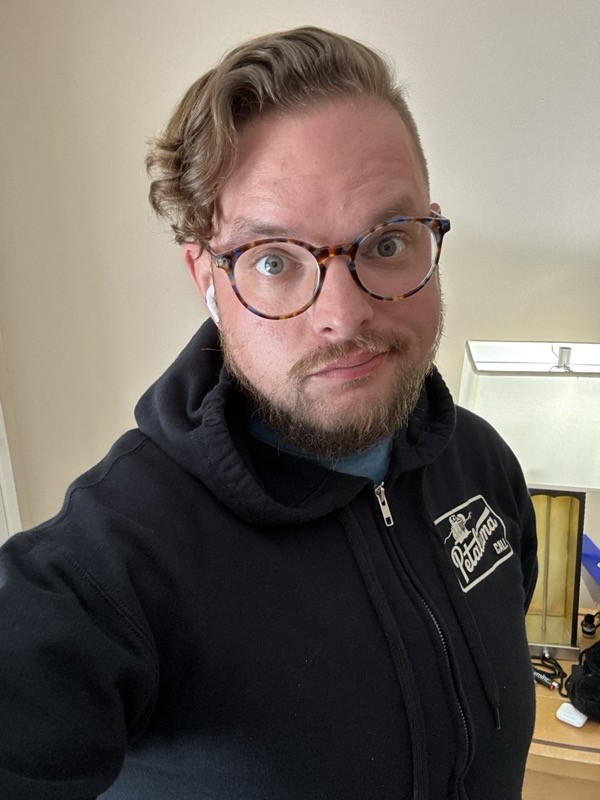 Selfie in a black hoodie after arriving in New Orleans