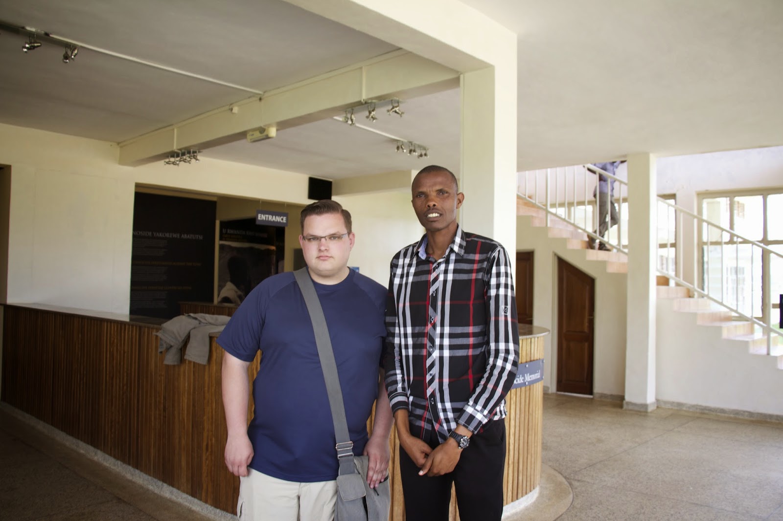 The author with the tour guide, a genocide survivor